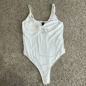 Never worn, white body suit